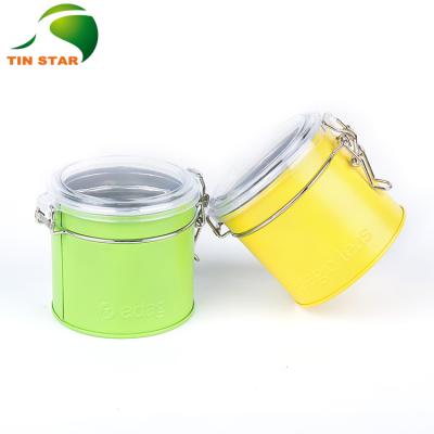 China Tea Europe And America Hot Selling Clear Plastic Lid Around Tea Tin Can With Metal Clip Wire for sale