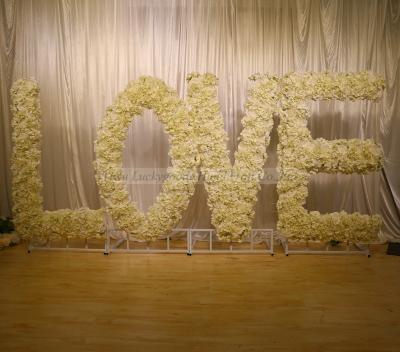 China Wedding Decoration LFB1241 Stage Letter Flower Backdrop Love Ivory Flower Arrangement With Stand for sale