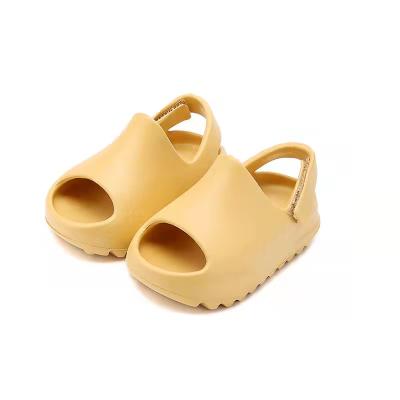 China Cheap Happy Smile PVC Eva Kids Bathroom Slippers Printed Small Rubber Shoes for sale