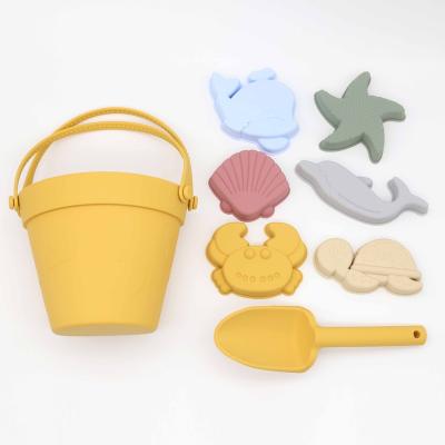 China 100% 8 Pcs Eco-Friendly Wholesale Outdoor Bucket Toys Cuctom Logo New Baby Children Summer Sand Sets Soft Silicone Sand Beach Toys For Kids for sale