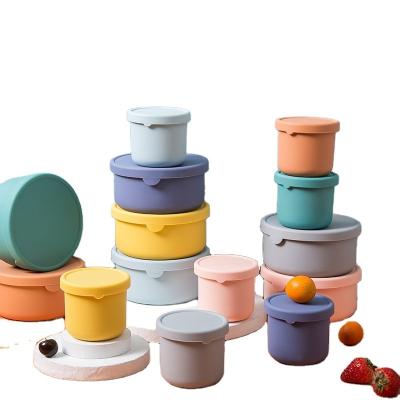 China Sustainable Food Grade 700ml Round Silicone Portable Kids School Bento Lunch Box Set Snack Food Storage Container Box for sale