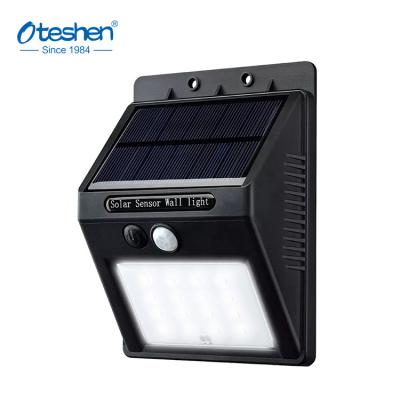 China Oteshen Garden IP44 Led Solar Motion Sensor Wall Lights Wireless Waterproof High Quality Outdoor Garden Light for sale