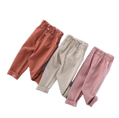 China Anti-wrinkle spring baby kids girls solid color ruffle waist button pocket high ankle-topped causal pants ankle gathered ankle-tied pants for sale