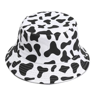 China Stylish Black White Cow Print Travel Sunscreen Bucket Hat Fashion Casual Wholesale Style New for sale