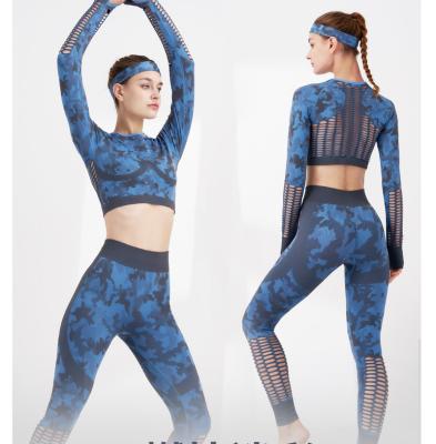 China Women Long Sleeve Yoga Suit Fitness Yoga Suit Camouflage Gym Clothing Sportswear Hollow-out Seamless Breathable Gaiters for sale