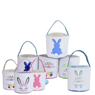 China Wholesale New Amazon Easter Canvas Easter Stored Bunny Tail Plush Ornament Egg Basket Bunny Storage Portable Basket Bucket for sale