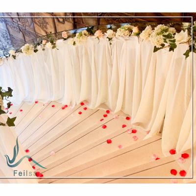 China Shiny New Designs Ice Silk Textile Fabric Table Skirt For Wedding Decoration for sale