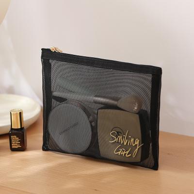 China Portable Black Cheap Makeup Organizer Bag Travel Toiletry Bag Mesh Casual Zipper Storage Pouch Beauty Cosmetic Make Up Case Bag For Ladies for sale