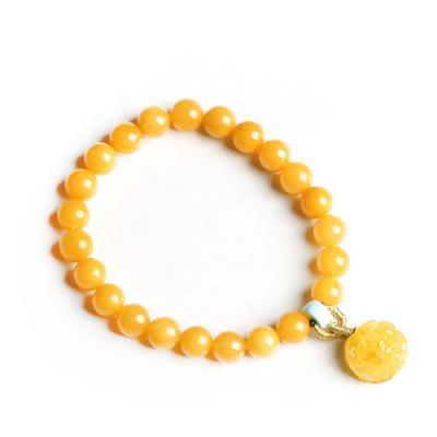 China Women Jewelry 6.5mm Chicken Pearl Oil Round Yellow Eco-Friendly Luxury Beeswax Bracelet Natural Mineral Bracelets With Turquoise Rose Dangle for sale