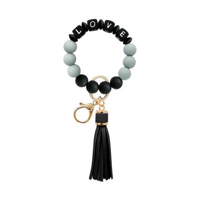 China Souvenir Gifts Promotion Men Women Car Key Ring Keychain Letter Printing Key LOVE Silicone Wristband Bracelet Beaded Bracelet For Couples for sale