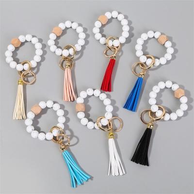 China Wholesale White Macrame Bracelet Strap Keychain Silicone Souvenir Gifts Promotion Men's Main Chain Bracelet With Tassel For Women for sale