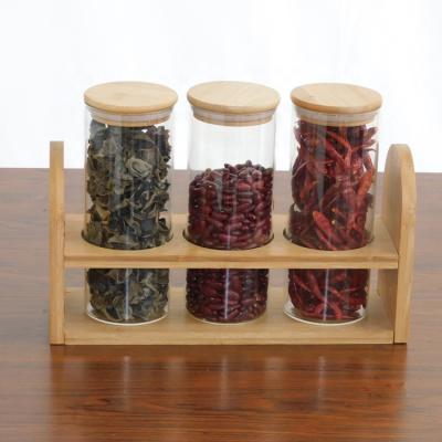 China Eco - Friendly Microwavable Clear Glass Spice Jar Sets With Bamboo Frame Base for sale