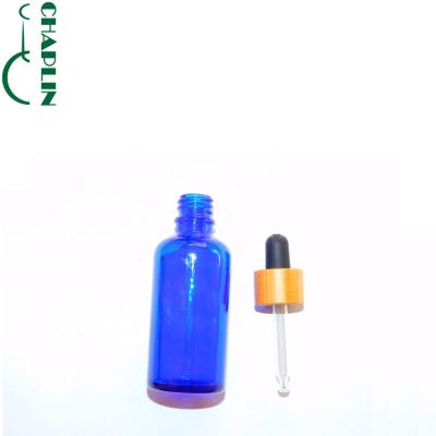 China 30ml cosmetic frosted clear frosted essential oil bottle glass pipette bottle with bamboo dropper for sale