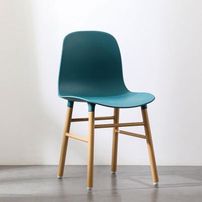 China (Other)Adjustable Commercial Building Office Used PC Backrest PP Seat Colored Beech Wood Legs Plastic Dining Chairs for sale