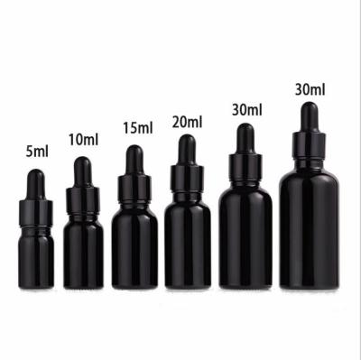 China Personal Care 5ml 10ml 20ml 30ml 50ml Essential Oil Bottle Gloss Black Glass Bottle for sale