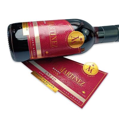 China Custom Waterproof Varnished Embossed Textured Red Wine Liquor Sticker Bottle Package Waterproof Personalized Adhesive Printing Label for sale