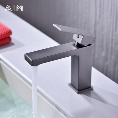 China Classic Design Basin Mixer Taps Single Hole Metered Deck Mounted Gray Brass Luxury Gun Design Basin Faucet for sale