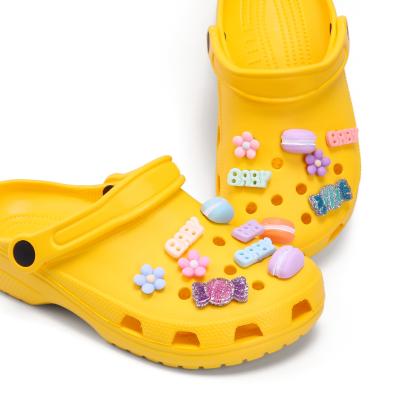 China Eco-froendly Glitter Candy Shoe Charm Smart Pink Girls Crystal Clear Charms Wholesale Bulk Plastic Bling Resin Teenagers Boy for sale