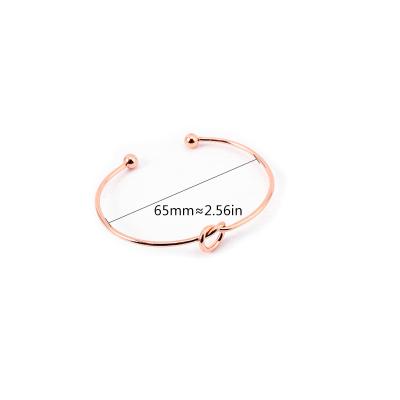 China DIY Bangle Charm Bracelet Stainless Steel Knot Wire Knot Bracelet Women for sale