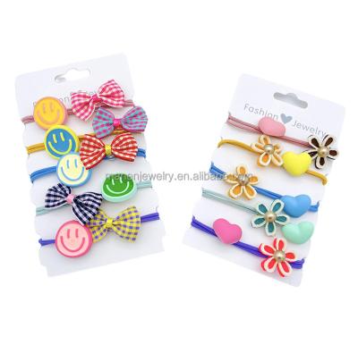 China 2022 New High Quality Fashion Children Back Smiley Rubber Band Girl Diamond Hair Tie Bow Tie Accessories Headband Girls Headpieces for sale