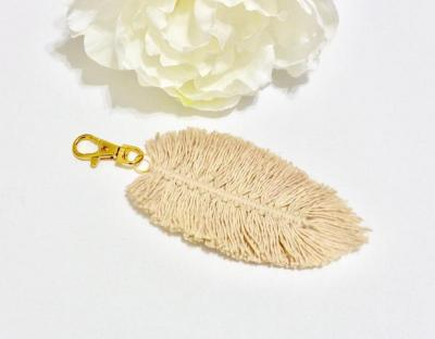 China Cotton Gold Feather Tassel Feather Chain Macrame Key Chain for sale