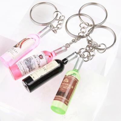 China Promotion Gift Wholesale Creative Simulation Red Wine Logo Custom Bottle Key Chain For Promotion Gifts for sale