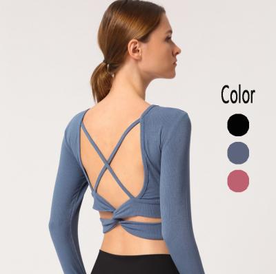 China 2021 New Celebrity Beauty Breathable Back Yoga Long Sleeve T-shirt Cross Web Slim Waistband Sports Fitness T-shirt Women With Breast Pad for sale