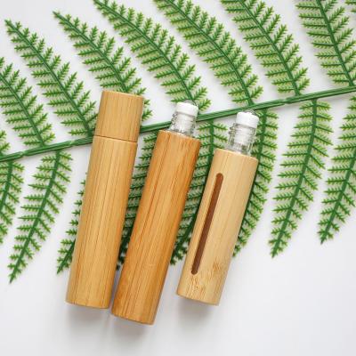 China Custom Cosmetic Packaging 5Ml Roll On Bottle Bamboo Lid Roller Bottle , Essential Oil Roller Bottles 10Ml Bamboo Lid for sale