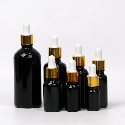 China Cosmetic 5Ml 10Ml 15Ml 20Ml 30Ml 50Ml 100Ml Frosted Black Glass Dropper Bottle , Essential Oil Bottle Black for sale