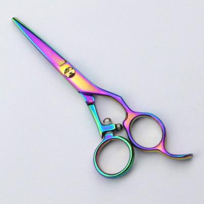 China Manija de reducción del estilo del eslabón giratorio de las tijeras del pelo revestido del arco iris para el corte del pelo en venta