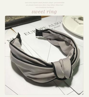 China Fashion Guaranteed Quality Fabric Unique Designer Luxury Hair Band Hair Band Accessory Bow for sale