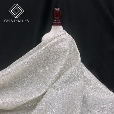 China New Order Breathable White Lace Fabric Dense Powder Glittering Gold Sprayed Fabric Suitable For Wedding Party for sale