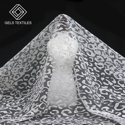 China New Breathable African Lace Fabric 2022 Polyester Fabric 100% Instant Tulle White Powder For Wedding Dress for sale