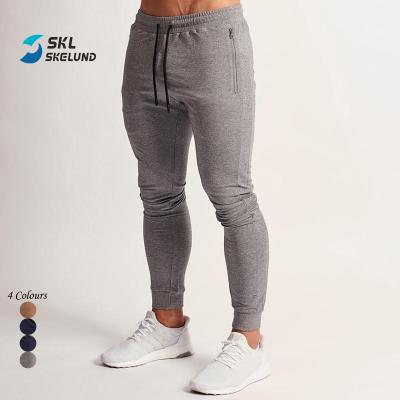 China QUICK DRY Mens Joggers Pants With Pockets Hide Casual Sportswear Sweat Gym Stacked Joggers Pants With Side Zipper Pockets for sale