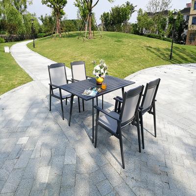 China 2022 New Design Hotel Modern Outdoor Rectangular Aluminum Dining Table 4 Seater Dining Table And Chair Set for sale