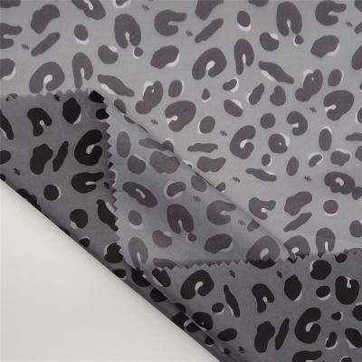 China 2020 Popular Anti-static Semi Dull Leopard Print Fabric 430T Polyester Taffeta For Duck Down Jackets for sale