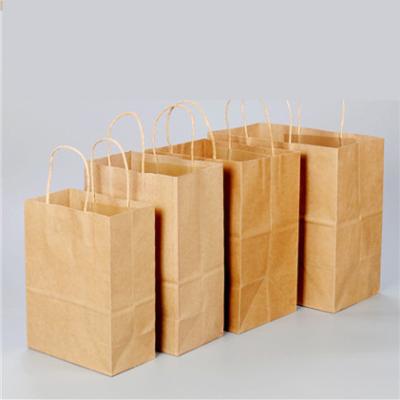 China Eco - Friendly Paper Bag Brown Kraft Paper Bag With Customized Logo Printing Gift Bags for sale