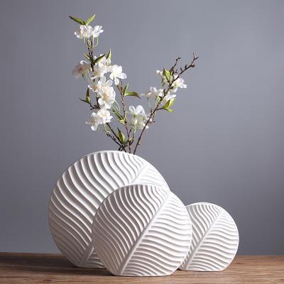 China Modern wholesale soft decoration ceramic flower vase simple white ceramic vase open ornament for vases decor for sale