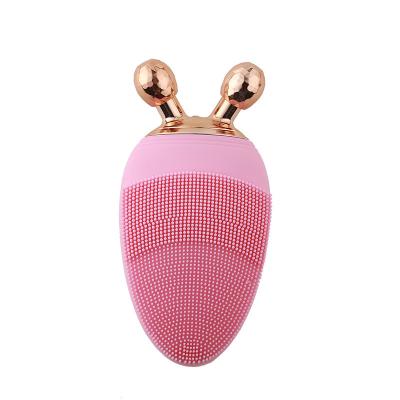 China DEEP CLEANSING Private Label 2 in 1 Pink Sonic Vibration Silicon Facial Cleanser Brush with Face Roller for sale