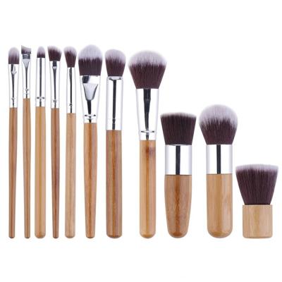 China Angular Blush 11pcs Private Label Bamboo Handle Makeup Brush Set With Cloth Bag for sale