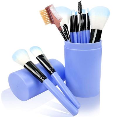 China Angular Blush Blue 12pcs Private Label Makeup Brush Set With Cylinder Case for sale