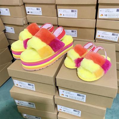 China Popular Custom Logo Design Breathable Unique Rubber Sheepskin Growing Fur Many Sizes Slips Wool Slippers for sale