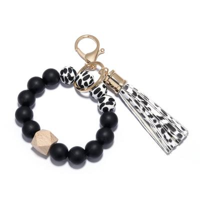 China 2022 New Fashional Souvenir Gifts Amazon Leopard Silicone Key Chain Bracelet Wholesale Custom Bead Llaveros Bracelet for sale