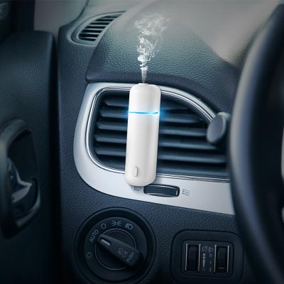 China Built in Sensor Factory Direct Selling Luxury Mini Car Aromatherapy Essential Oil Diffuser Portable Moving Air Purifier for sale