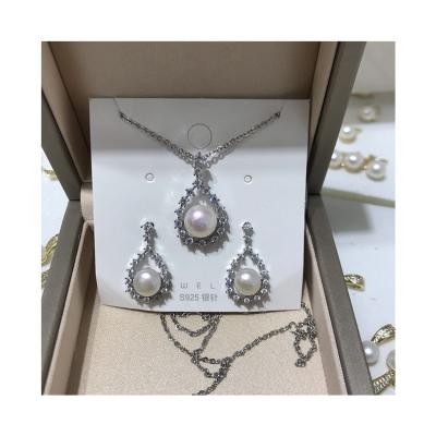 China Other Freshwater Drop Shape 925 Sterling Silver Gold Color Pearl Jewelry Sets Diamond Earrings And Pendant Set For Women for sale