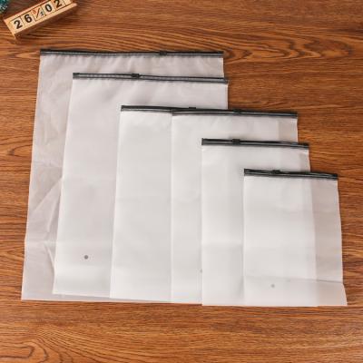 China 2022 Wholesales Disposable Recycle Frosted Plastic Bag With Transparent Zipper Clothes Storage Bag Custom Frosted Zipper Plastic Bag for sale