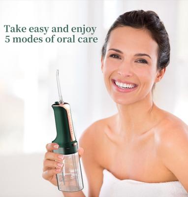 China Electric Portable Oral Irrigator Teeth Cleaning 250ml Handheld Water Flosser for sale