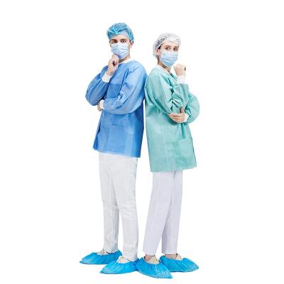 China non woven disposable lab jacket blue with knitted collar and cuff for sale