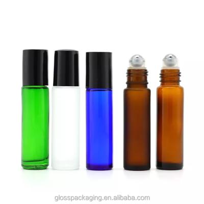 China Cosmetic wholesale octagonal 10ml slim metalcustomized logo perfume oil roll on glass bottle with roller ball with wooden cap for sale