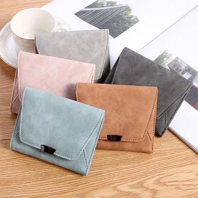 China Fashion Wholesale Casual Mini Wallet Short Card Holder Casual Solid Trendy Fold PU Leather Wallet For Women for sale